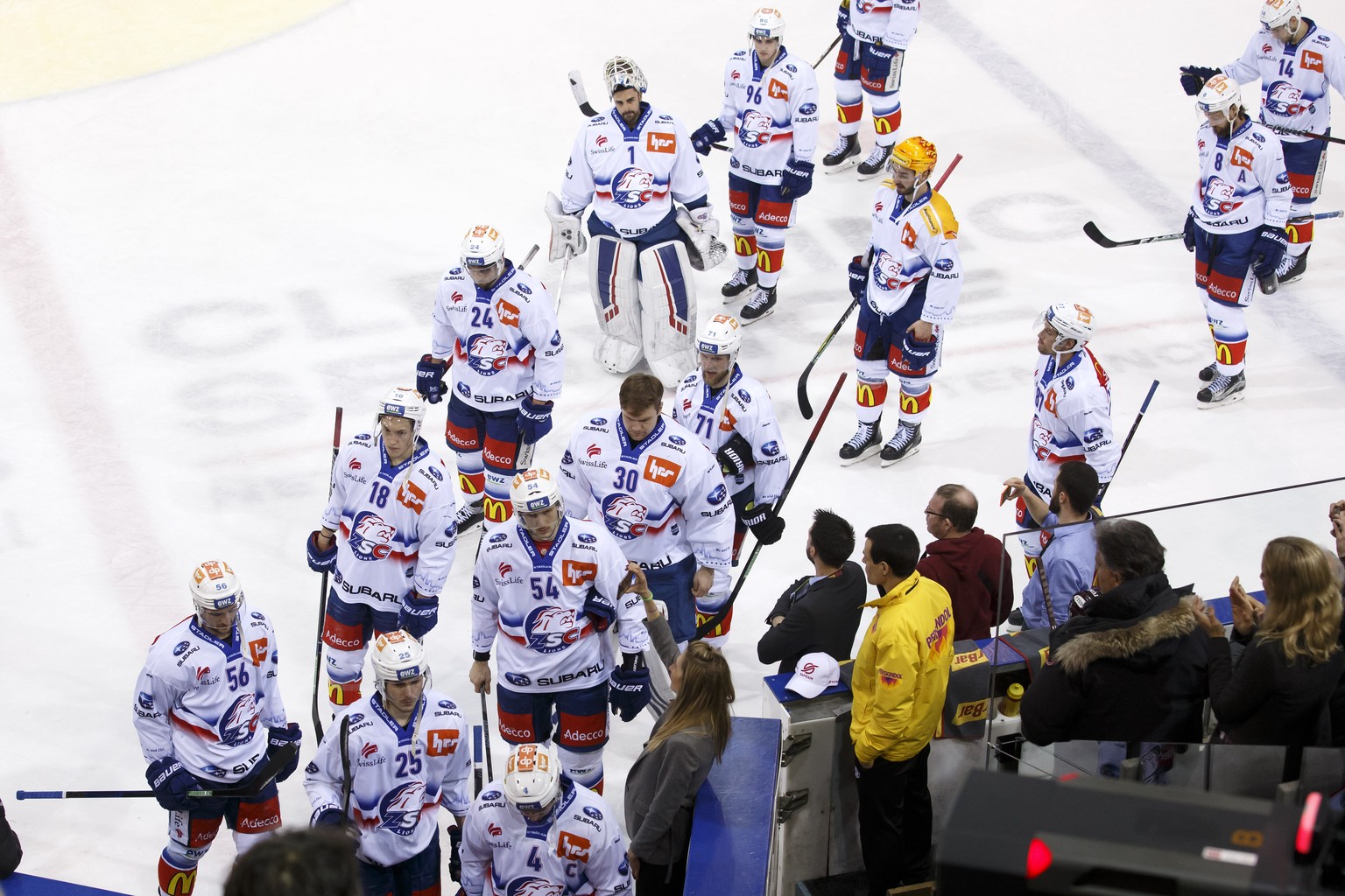 Lions&#039; players leave the rink after losing against Geneve-Servette, during a National League regular season game of the Swiss Championship between Geneve-Servette HC and ZSC Lions, at the ice sta ...