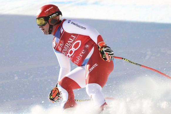 Switzerland&#039;s Beat Feuz gets to the finish area after completing an alpine ski, men&#039;s World Cup downhill, in Val d&#039;Isere, France, Sunday, Dec. 13, 2020. (AP Photo/Alessandro Trovati)