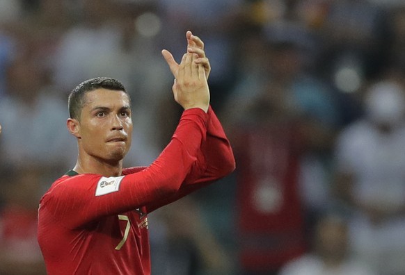 Portugal&#039;s Cristiano Ronaldo applauds after the group B match between Portugal and Spain at the 2018 soccer World Cup in the Fisht Stadium in Sochi, Russia, Friday, June 15, 2018. (AP Photo/Serge ...