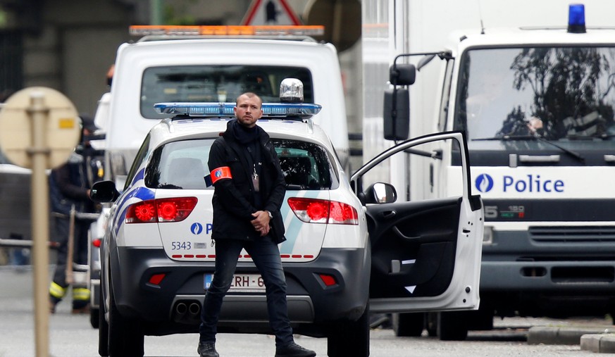 Ein Polizist im Brüsseler Stadtteil Etterbeek am 17. Juni.<br data-editable="remove">