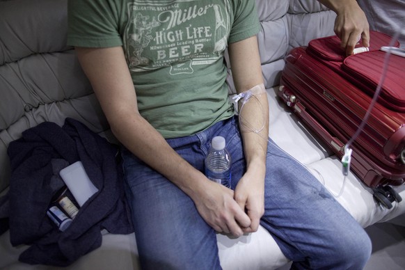 A patient is hooked up to an IV for a hangover treatment in Las Vegas on Sunday, April 15, 2012. (AP Photo/Julie Jacobson)
Be Well-IV Therapy