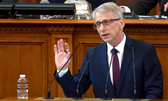 epa10675921 The new Prime Minister Nikolay Denkov speaks after taking the oath at the Parliament in Sofia, Bulgaria, 06 June 2023. The two largest parties in Bulgaria, the conservative GERB and the re ...