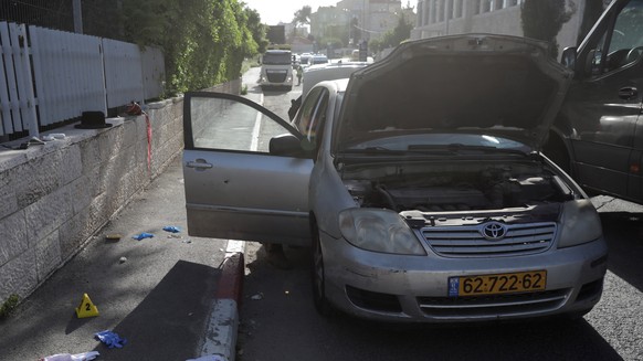 epa10577885 The scene of an attack in Sheikh Jarrah neighborhood of East Jerusalem, April 18, 2023. According to police two Orthodox Jews where shot and injured in their vehicle by a Palestinian shoot ...