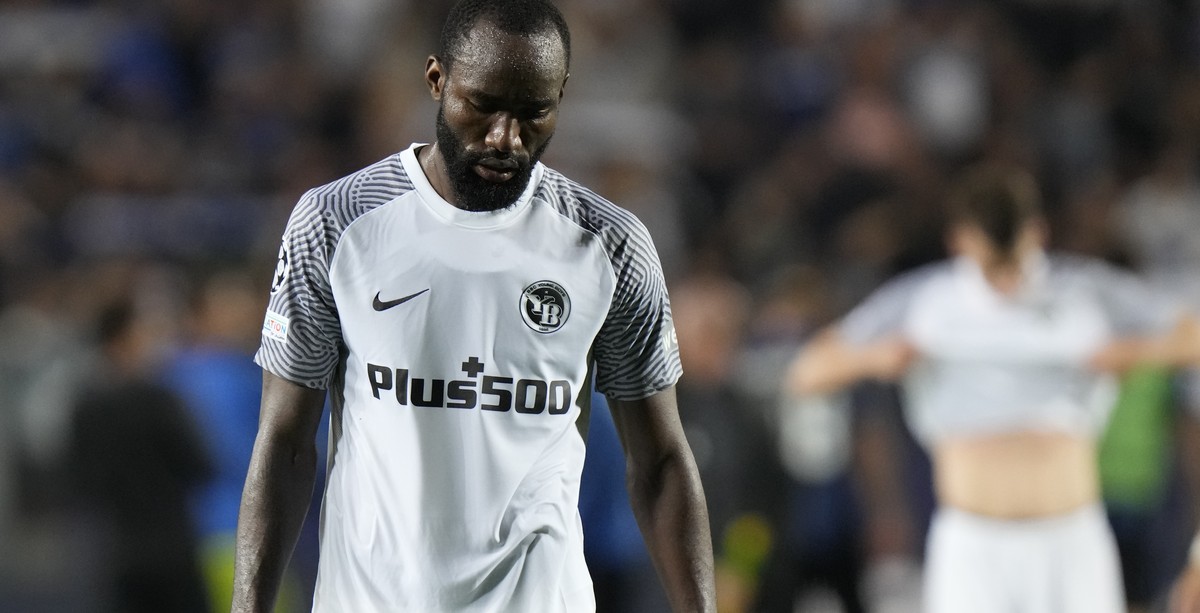 Young Boys' Moumi Ngamaleu walks off the pitch in dejection at the end of the Champions League Group F soccer match between Atalanta and Young Boys, at the Gewiss Stadium in Bergamo, Italy, Wedne ...