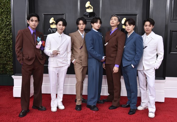 FILE - BTS arrives at the 64th Annual Grammy Awards on April 3, 2022, in Las Vegas. The group says they are taking time to focus on solo projects. The seven-member group with hits like