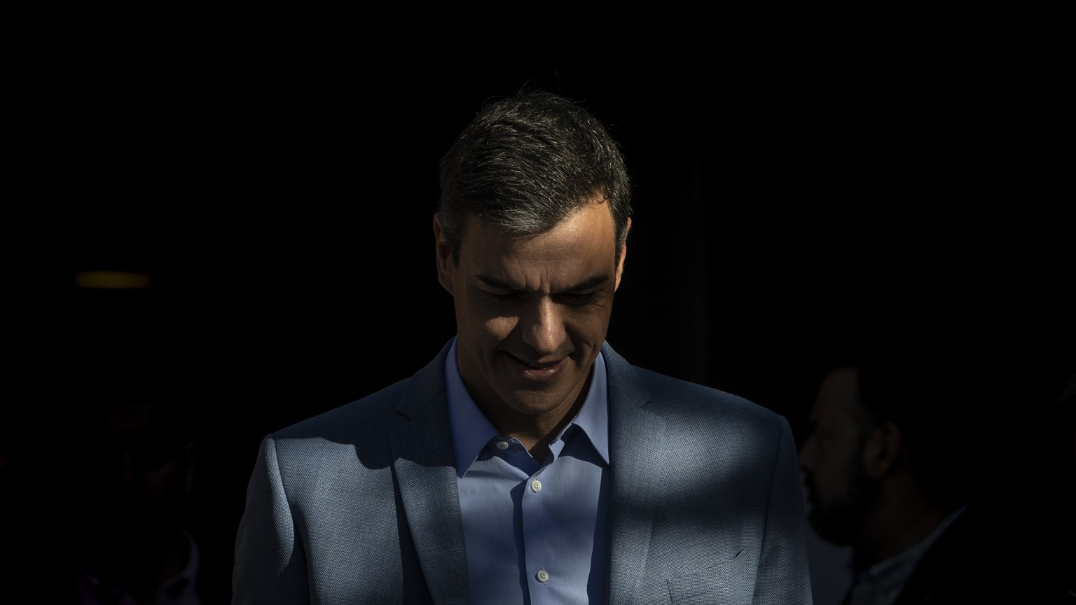 Spanish Prime Minister and Socialist Party candidate Pedro Sanchez leaves a polling station after casting his vote during Spain&#039;s general election in Pozuelo de Alarcon, outskirts of Madrid, Sund ...