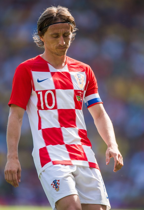 epa06783075 Croatiaâs Luca Modric reacts during the international soccer friendly match between Brazil and Croatia at Anfield in Liverpool, Britain, 03 June 2018. EPA/PETER POWELL