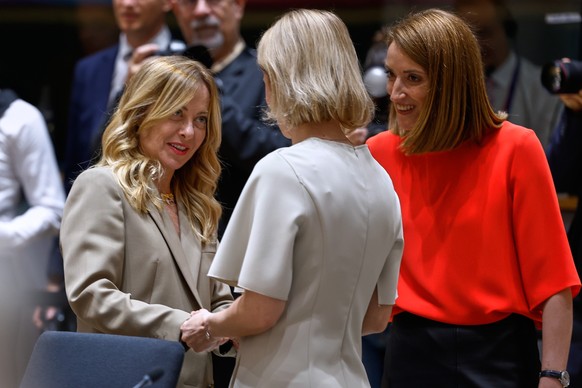 From left, Italy's Prime Minister Giorgia Meloni talks to European Union foreign policy chief Kaja Kallas and European Parliament President Roberta Metsola during to a round table meeting at the  ...
