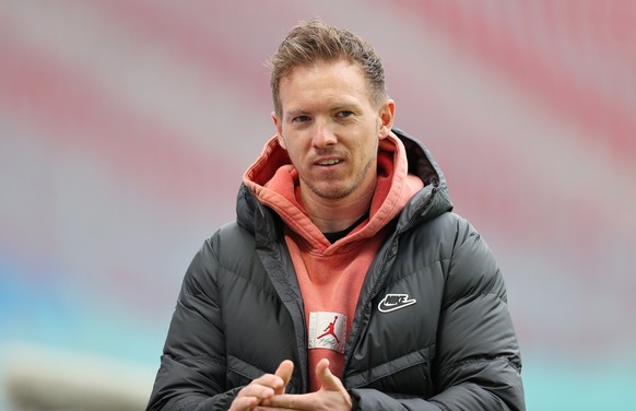 epa09073821 Julian Nagelsmann, Head Coach of RB Leipzig looks on prior to the Bundesliga match between RB Leipzig and Eintracht Frankfurt at Red Bull Arena in Leipzig, Germany, 14 March 2021. EPA/BORI ...