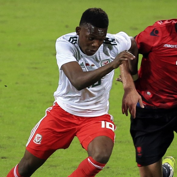 Albania&#039;s Migen Basha, right, and Wales&#039; Rabbi Matondo, fight for the ball during the international friendly soccer match between Albania and Scotland at Elbasan Arena, in Elbasan, southern  ...