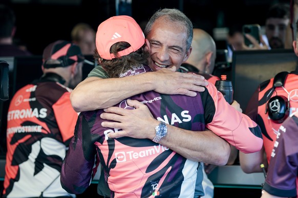 epa12070251 Mercedes driver Andrea Kimi Antonelli of Italy hugs his father Marco Antonelli after taking Sprint pole in the Sprint Qualifying session in Miami Gardens, Florida, USA, 02 May 2025. The 20 ...