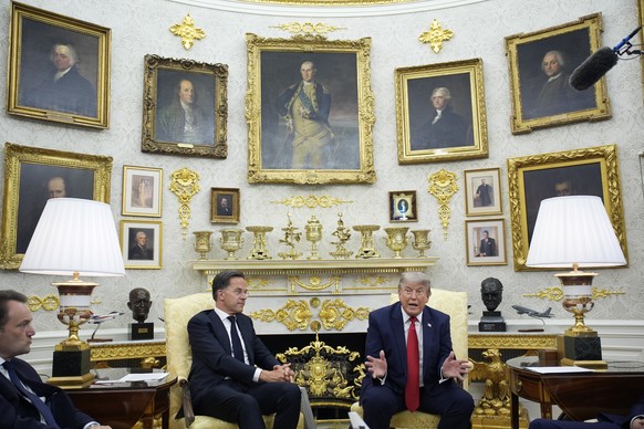 epa13062063 US President Donald Trump (R) meets with Mark Rutte (L), Secretary General of the North Atlantic Treaty Organization (NATO), in the Oval Office of the White House in Washington, DC, USA, 2 ...
