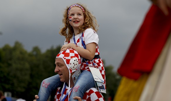 Croatia fans arrive for the semifinal match between Croatia and England at the 2018 soccer World Cup in the Luzhniki Stadium in Moscow, Russia, Wednesday, July 11, 2018. (AP Photo/Rebecca Blackwell)