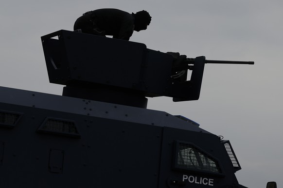 epa09481718 Kosovo Police Special Operations Unit secure the area near the border crossing between Kosovo and Serbia in Jarinje, Kosovo, 22 September 2021. Kosovo Serbs in the northern part of the eth ...