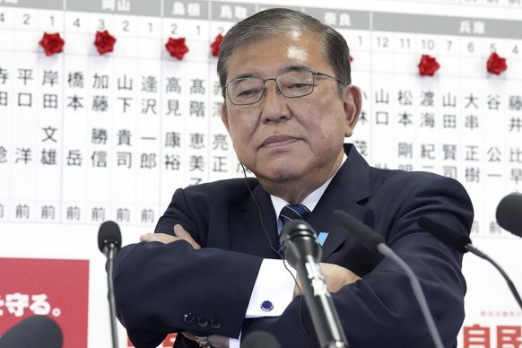 Japan&#039;s Prime Minister and president of the Liberal Democratic Party (LDP) Shigeru Ishiba pauses as he speaks to the media regarding the lower house election, at the LDP headquarters Sunday, Oct. ...