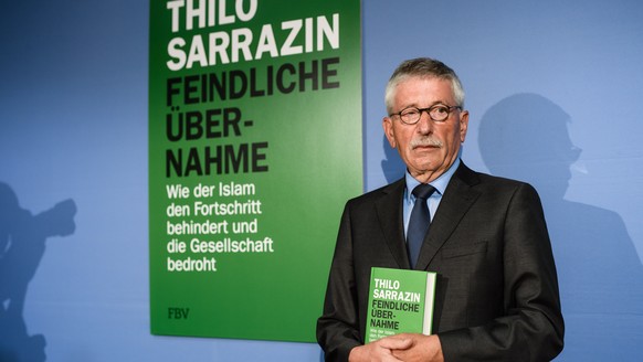 epa06983222 Former Berlin Senator for Finance and Executive Board member of the Bundesbank, Thilo Sarrazin, poses at the podium during the presentation of his new book, &#039;Feindliche Uebernahme. Wi ...