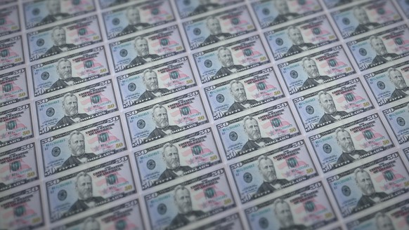 50 US dollars bills printed in illegal money production conveyor. Collage of many fake bills. Concept of counterfeitters work, 50 US dollars bills printed in illegal money production conveyor. Collage ...