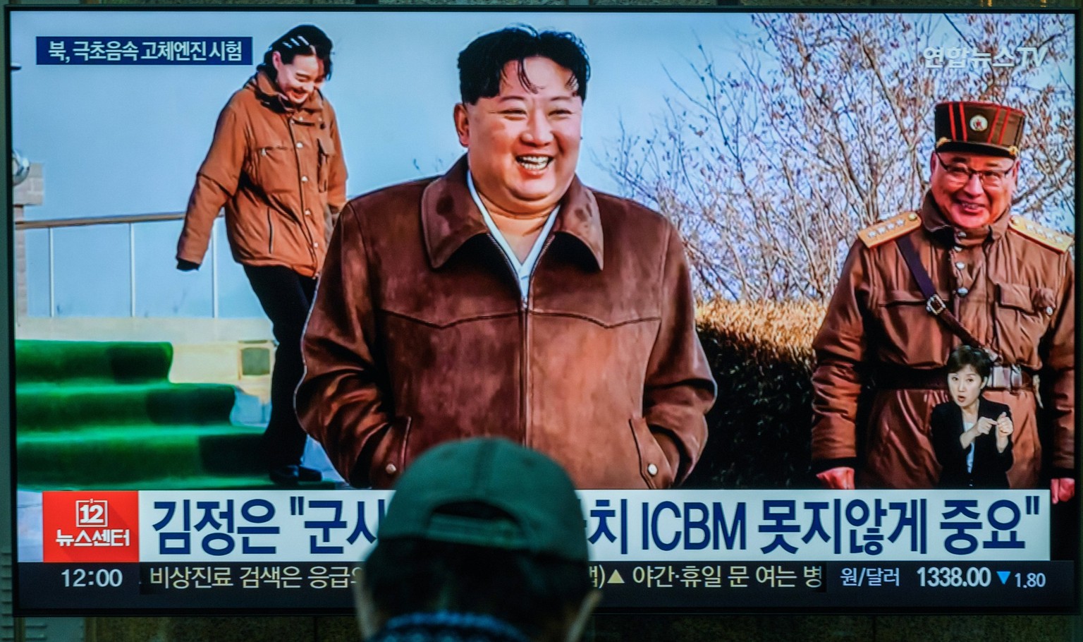 March 20, 2024, Seoul, South Korea: South Korea s 24-hour YonhapnewsTV shows North Korean leader Kim Jong Un C smiling after overseeing a ground jet test of a solid-fuel engine for a new-type intermed ...