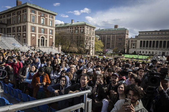 Students and press look on as Speaker of the House Mike Johnson (R-LA) speaks to the media on the Low Library steps on Columbia University&#039;s campus in New York on Wednesday April 24, 2024. (AP Ph ...