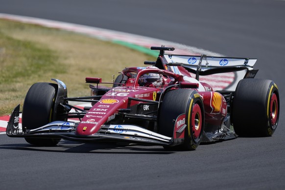 Ferrari driver Charles Leclerc of Monaco steers his car during the first practice session for the Japanese Formula One Grand Prix at the Suzuka Circuit in Suzuka, central Japan, Friday, April 4, 2025. ...