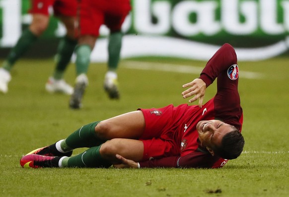 epa05419071 Cristiano Ronaldo of Portugal reacts during the UEFA EURO 2016 Final match between Portugal and France at Stade de France in Saint-Denis, France, 10 July 2016.


(RESTRICTIONS APPLY: Fo ...