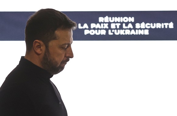 Ukrainian President Volodymyr Zelenskyy arrives to give a press conference with French President Emmanuel Macron following a bilateral meeting at the Elysee Palace in Paris, Wednesday, March 26, 2025. ...