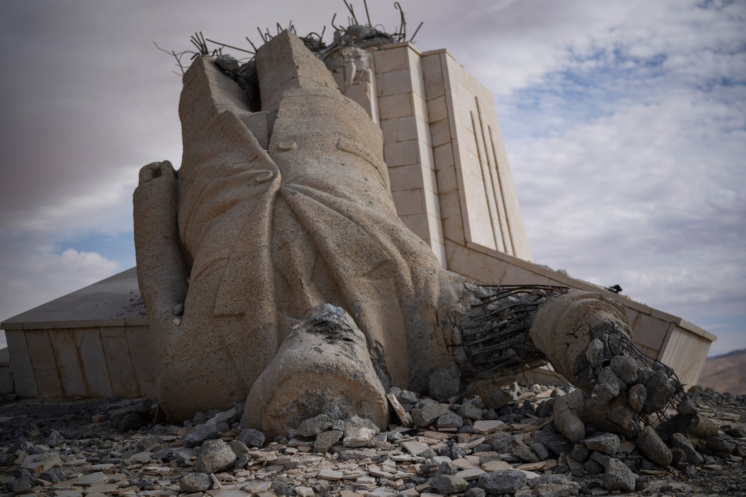 A statue depicting late Syrian President Hafez Assad is seen destroyed on the top of a mount in Dayr Atiyah, Syria, Jan. 5, 2025. (AP Photo/Leo Correa, File)
YE Mideast 2025 Photo Gallery