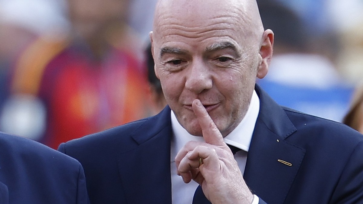 epaselect epa13121822 US president Donald Trump (L) and FIFA President Gianni Infantino (R) leave the field after the victory ceremony of the FIFA World Cup 2026 final match Spain against Argentina, i ...