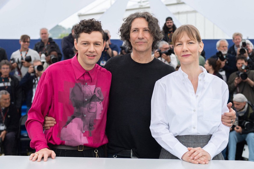 Cannes The Zone Of Interest Photocall AM Christian Friedel, Jonathan Glazer and Sandra Huller attending the The Zone Of Interest Photocall as part of the 76th Cannes Film Festival in Cannes, France on ...