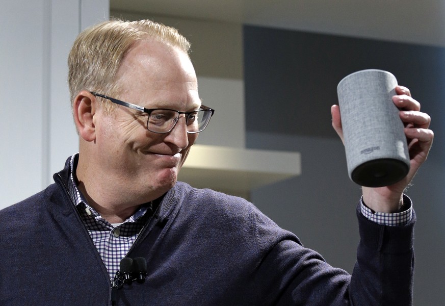 David Limp, senior vice president of Devices and Services at Amazon, smiles as he displays a new Amazon Echo during an event announcing several new Amazon products by the company, Wednesday, Sept. 27, ...