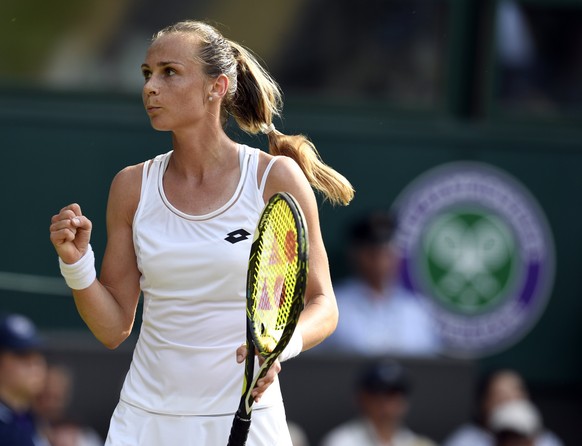 epa06070444 Magdalena Rybarikova of Slovakia scores against Karolina Pliskova of the Czech Republic in their second round match during the Wimbledon Championships at the All England Lawn Tennis Club,  ...