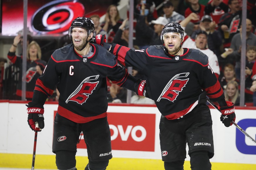 Carolina Hurricanes' Nino Niederreiter, right, celebrates his goal with Jordan Staal during the second period of the team's NHL hockey game against the Dallas Stars in Raleigh, N.C., Thursday, March 2 ...