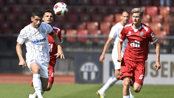 Der Zuercher Blerim Dzemaili, links, beim Fussballspiel der Super League FC Zuerich gegen den FC Lugano im Stadion Letzigrund in Zuerich am Montag, 29. Mai 2023. (KEYSTONE/Walter Bieri)