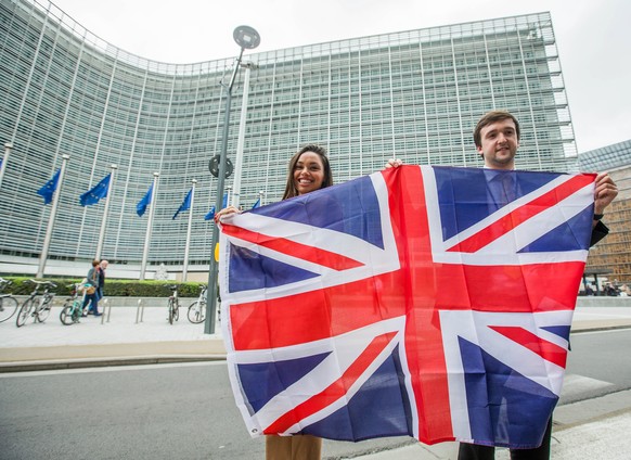 epa05877098 Unidentified members of Britain&#039;s UK Independence Party (UKIP) hold a Union flag as they celebrate the official triggering of Article 50 of the Lisbon Treaty, dubbed &#039;Brexit&#039 ...