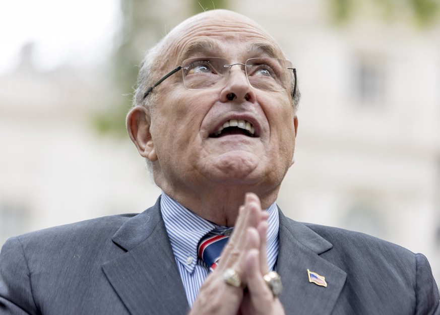 epa10000599 Rudolph W. Giuliani, President Donald J. Trump?s former personal lawyer, gestures during a small press conference with his son Andrew Giuliani, who is running for New York Governor, in New ...