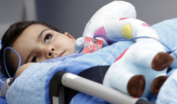 British boy Ashya King arrives for first proton beam treatment of his brain tumor at Proton Therapy Center in Prague, Czech Republic, Monday, Sept. 15, 2014. Ashya’s parents have fought a protracted b ...