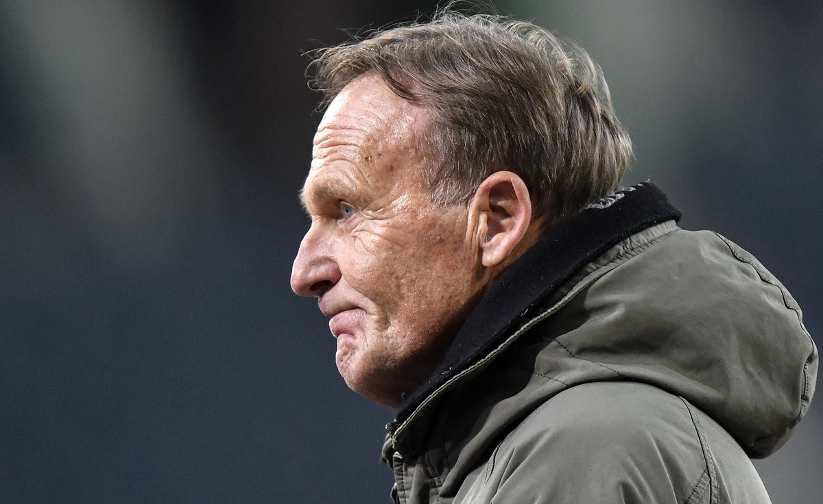 Dortmund's CEO Hans-Joachim Watzke looks skeptical prior the German Bundesliga soccer match between Borussia Moenchengladbach and Borussia Dortmund in Moenchengladbach, Germany, Friday, Jan. 22,  ...