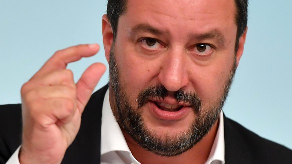 epa07043178 Italian Minister of Interior Matteo Salvini gestures during a press conference at the end of council of ministers, in Rome, Itay, 24 September 2018. The cabinet has approved the so-called  ...