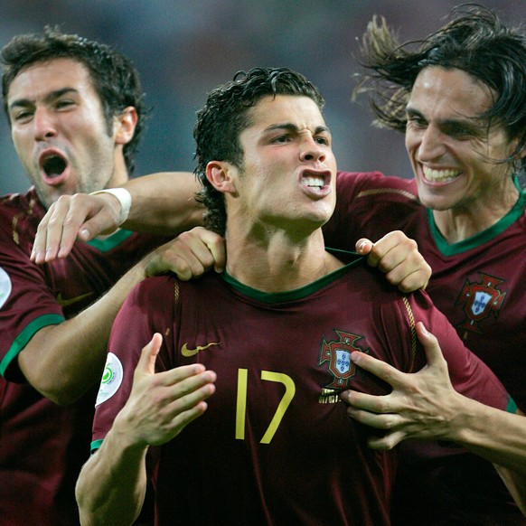 FILE - Portugal's Cristiano Ronaldo celebrates with teammates after scoring the winning penalty kick in a shootout against England during the quarterfinal World Cup soccer match in Gelsenkirchen, ...
