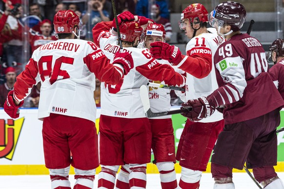 epa07580613 Players of Russia celebrate their 2-1 lead during the IIHF World Championship group B ice hockey match between Latvia and Russia at the Ondrej Nepela Arena in Bratislava, Slovakia, 18 May  ...