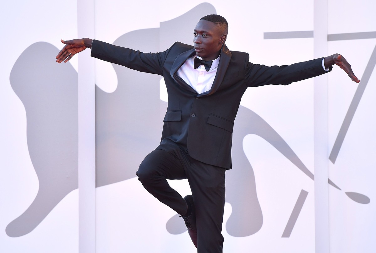 epa09449694 Senegalese-born Italian blogger Khaby Lame arrives for the premiere of 'Illusions Perdues' (Lost Illusions) during the 78th annual Venice International Film Festival, in Venice,  ...