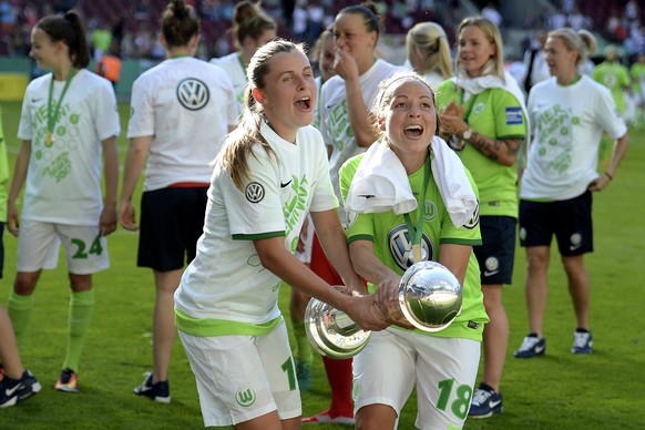 epa05993690 Wolfburg&#039;s Noelle Maritz (L) and Vanessa Bernauer (R) celebrate with the trophy after winning the German Women&#039;s DFB Cup final between SC Sand and VfL Wolfsburg at Rheinenergiest ...