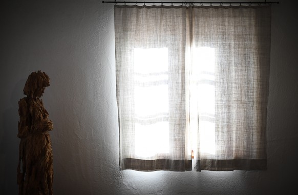 epa09756489 A statue of a pregnant woman is displayed in the birth-room at the birth house of Pope Emeritus Benedict XVI in Marktl, Germany, 14 February 2022. The former Pope, born as Joseph Ratzinger ...