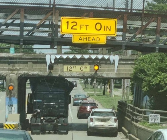 Penny the Truck Eating Bridge – courtesy of the non-profit organisation STUPID Lansing. 
https://www.facebook.com/StupidLansing/