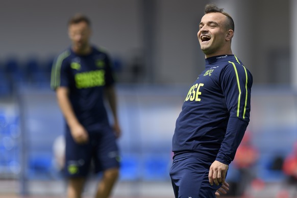 Switzerland&#039;s midfielder Xherdan Shaqiri smiles during a training session of the Switzerland&#039;s national soccer team at the Torpedo Stadium, in Togliatti, Russia, Wednesday, June 13, 2018. Th ...