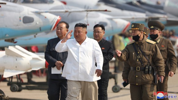 epa08374707 A photo released by the official North Korean Central News Agency (KCNA) shows North Korean leader Kim Jong Un inspecting an air defense unit in western area, North Korea, 12 April 2020. S ...
