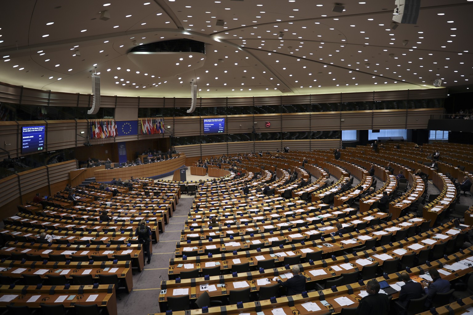 FILE - In this Thursday, Jan. 31, 2019 file photo, European Parliament members attend a plenary session at the European Parliament in Brussels. Microsoft says it has detected hacking attacks aimed at  ...