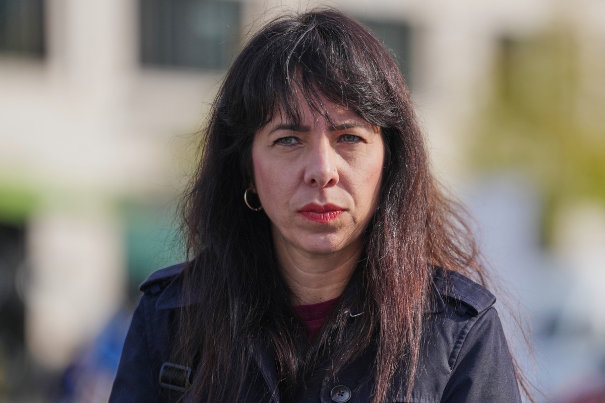 Berlin's Left Party leader Elif Eralp visits an installation displaying portraits of victims of the Oct. 7 Hamas attack on Israel, marking the third anniversary of the attack, at the Brandenburg  ...