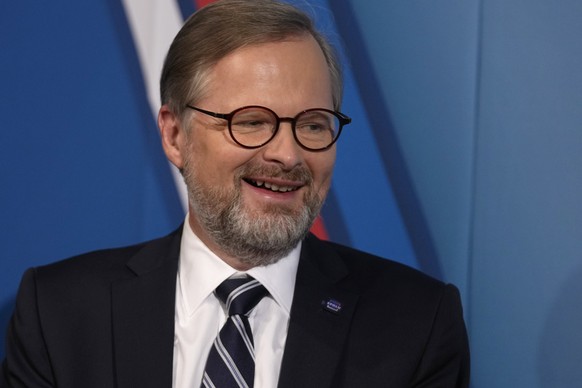 FILE - Leader of center-right Spolu (Together) coalition Petr Fiala attends the last debates at the public radio before the poll stations open for the parliamentary election in Prague, Czech Republic, ...