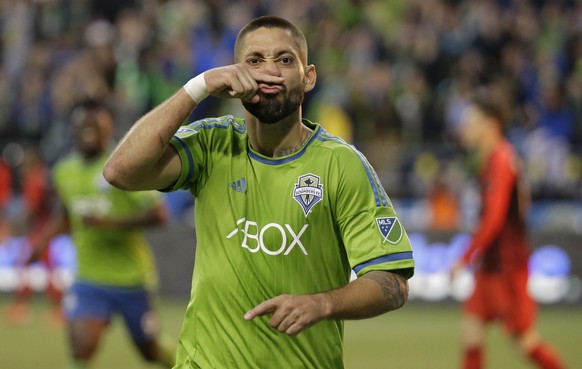 Seattle Sounders&#039; Clint Dempsey gestures as he celebrates scoring a goal against the Portland Timbers in the second half of an MLS soccer match, Sunday, April 26, 2015, in Seattle. The Sounders b ...